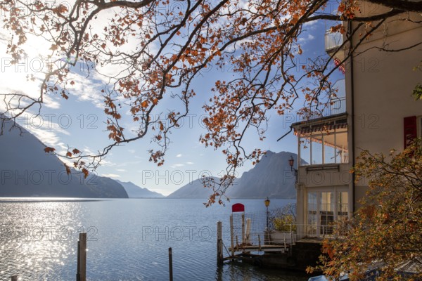 Some hotel on Lake Lugano on a sunny day while hiking the Oliver Trail in Lugano, fantastic autumn