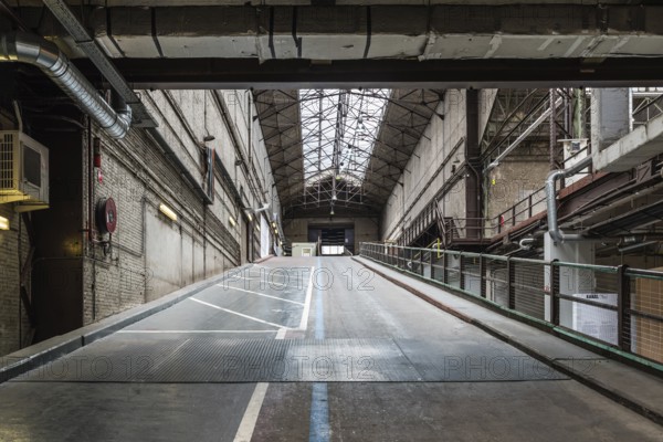 Brussels, Belgium, 05 23 2018: Industrial garage hall of the Kanal Centre Pompidou, now a museum,