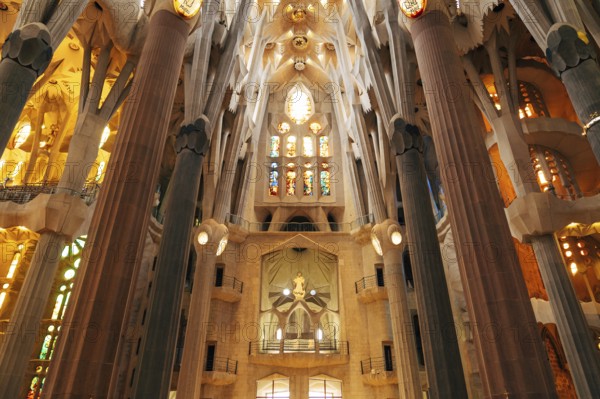 Barcelona, Spain - 15 December 2019: Sagrada Familia interiors - columns, vaults, stained glass and