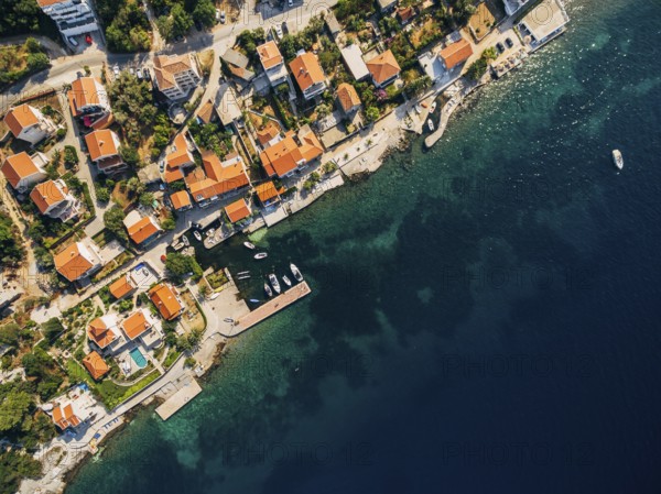 Aerial footage from the drone - villas, houses and hotels on the beach in Montenegro, the Adriatic