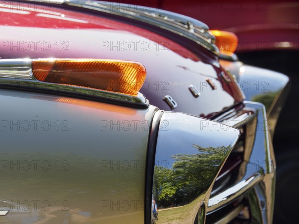 Detailed view of a vintage car with red paintwork and chrome accents, Bocholt, Münsterland,