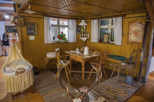 Farmhouse parlour with Herrgottswinkel and children's bed, local history museum, Wiggensbach,