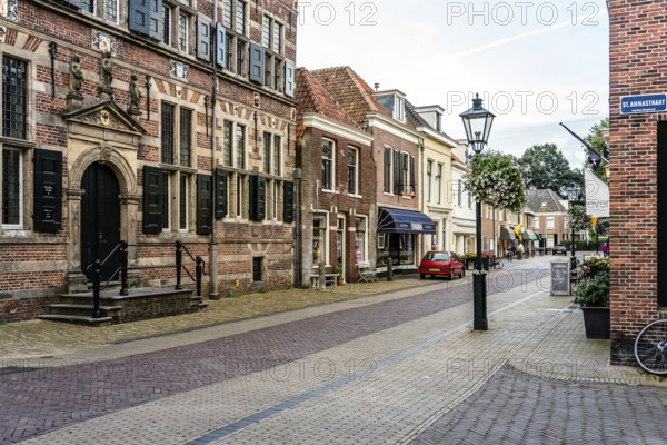 Naarden, Netherlands, August 5, 2016: Picturesque street in Naarden city centre. Naarden was