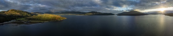 Evening mood at Loch Alsh with Tulach Ard hill and Skye Bridge, drone shot, Reraig, Kyle, Scotland,