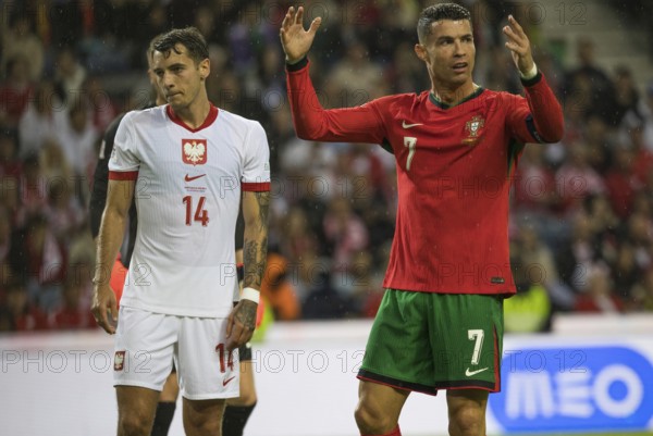 Football match, captain Cristiano RONALDO CR7 Portugal right. protests angrily with raised arms and