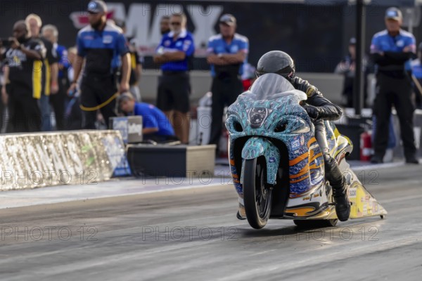 Sep 22, 2023-Concord, NC: NHRA Pro Stock Motorcycles Series driver, Jerry Savoie, runs down the
