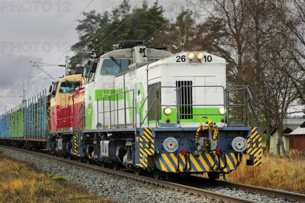 VR freight train with two diesel locomotives, Dv12 No. 2610 in the front pulling carriages full of