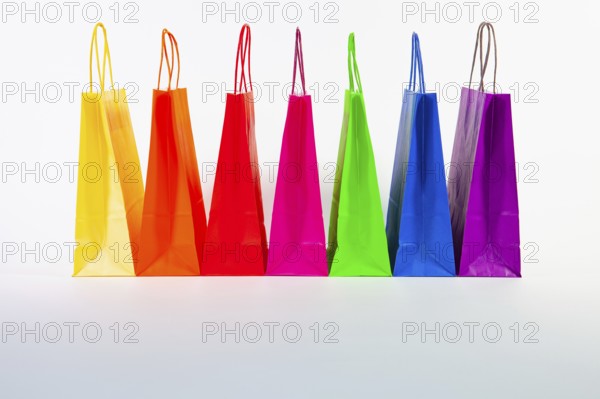 Set of colorful empty shopping bags isolated on the white background. Sale, consumerism,