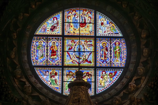 SIENA, ITALY, SEPTEMBER 23, 2023, Rich ornate window with mother mary above the presbytery of the