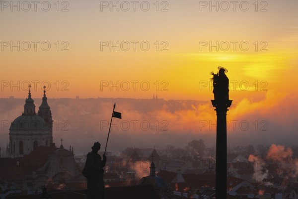 The Church of St.Nicholas in the mist. Prague, Czech Republic.This is the most famous Baroque