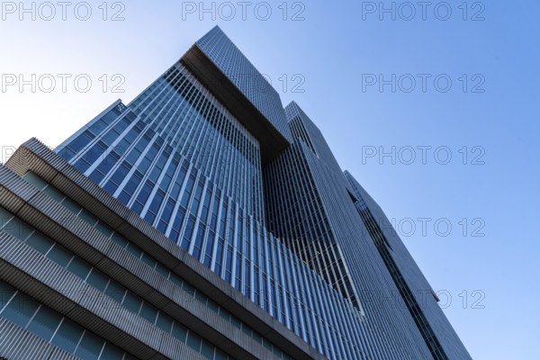 Rotterdam, Netherlands, May 8, 2022: De Rotterdam Skyscraper against sky. Designed by Rem Koolhaas