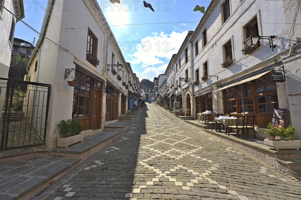 Historic city center of Gjirokastra with souvenir shops and restaurants, which has been modernises