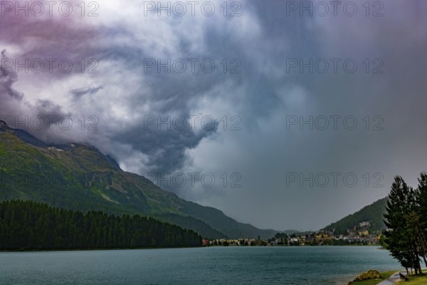 Panoramic View over City and Lake Sankt Moritz and Mountain Valley with Beautiful Storm Clouds in a