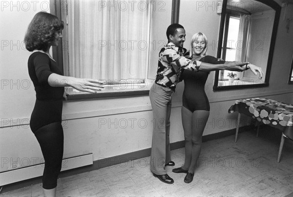 The pop group ABBA. Its two female members Anni-Frid Lyngstad and Agnetha Fältskog practice and