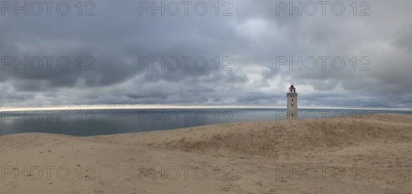 Abandoned Rubjerg Knuhe Lighthouse is located on the coast of the North Sea in Rubjerg, in the