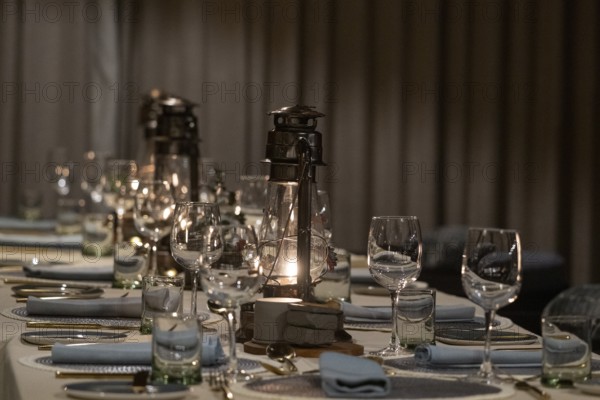 Set table with paraffin lamp, Qwabi Private Game Reserve, Biosphere Reserve, Limpopo, South Africa,