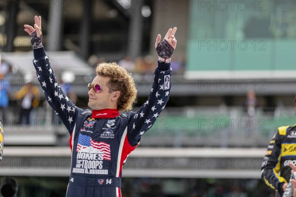 INDYCAR driver, SANTINO FERRUCCI (14) of Woodbury, Connecticut, waves to the fans before racing for