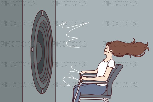 Deafened woman near giant subwoofer from music center listening to loud rhythmic track with bass