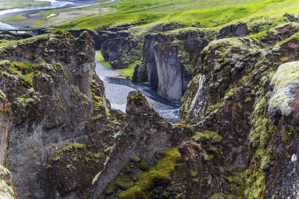 Iceland. The beautiful and mysterious canyon Fyadrarglyufur. Cloudy summer day. River with glacial