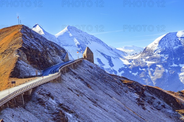 The famous panoramic mountain road Grossglocknerstrasse. Snow-capped mountain peaks are covered