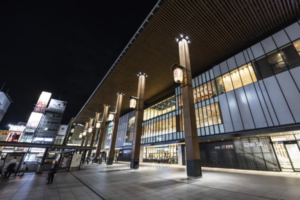 NAGANO, JAPAN - SEPTEMBER 17 2024: The beautiful architecture of Nagano Train Station at night in
