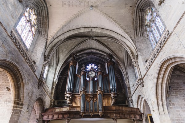 Vannes, France, August 6, 2018: Pipe organ and vaults of the Cathedral of Vannes. It is a Roman