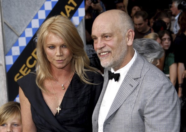 HOLLYWOOD, CA - SEPTEMBER 30, 2010: John Malkovich and Peta Wilson at the Los Angeles premiere of