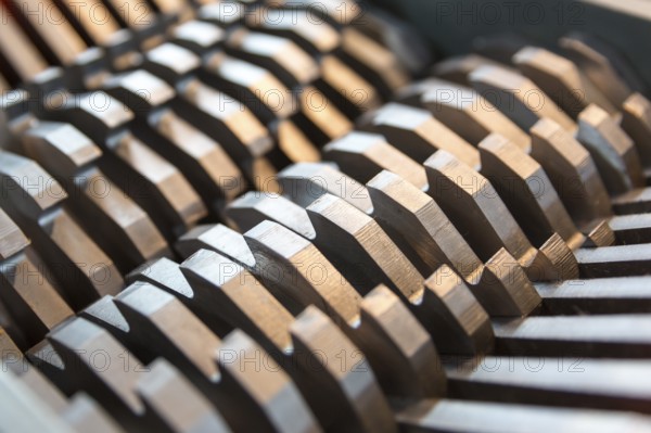 Metal blades of a chopper machine. New sharp blades made of hardened steel. Ready to cut anything.