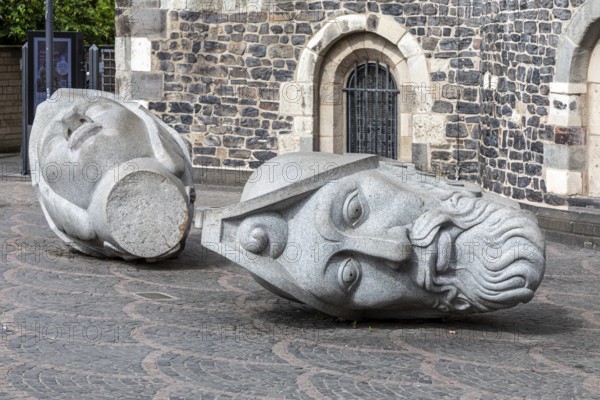 Heads of Bonn's patron saints Cassius and Florentus in front of Bonn Minster - Bonn, North