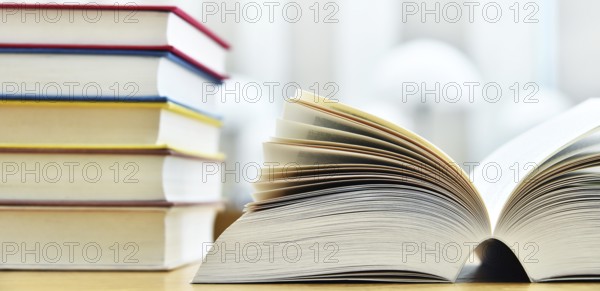 Books lying on the table in the public library