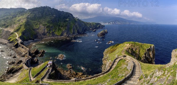 Bakio, Spain - 3 May, 2022: long and winding stone stairs leading up to the Church of San Juan de