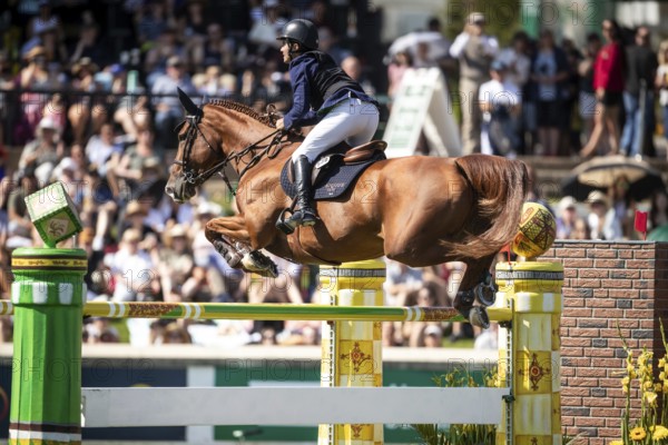 Juan Manuel Gallego of Columbia and riding Fee Des Sequoias Z compete in the first round of the 1