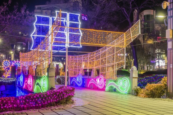 Taebeck, South Korea. January 29, 2019: Boat made of lights constructed on bridge over downtown