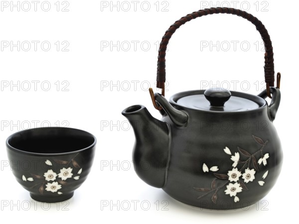 China tableware for chinese tea ceremony: teapot and bowl over white background