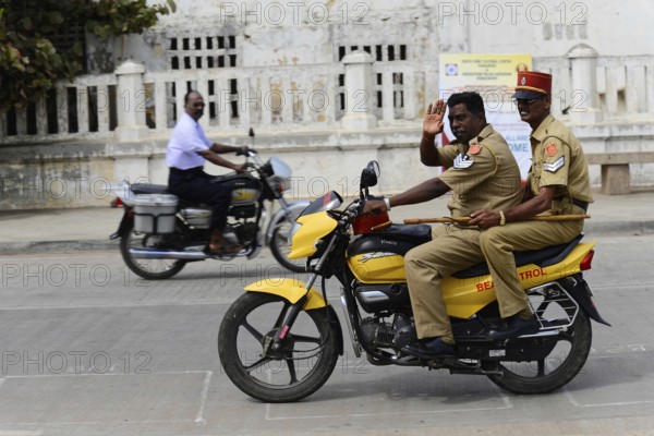 South India, Thanjavur, Madurai, Kovalam, Malabar Coast, Malabar, Kerala, Two policemen on a yellow