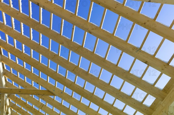 Roof construction made of wood, symbolic photo for home ownership, house construction and house