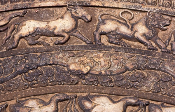 Sandakada pahana is an elaborately carved semi-circular stone slab, usually placed at the bottom of