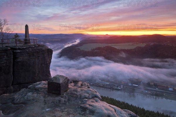 Morning fog and twilight over the Elbe valley at Lilienstein, Saxon Switzerland National Park,