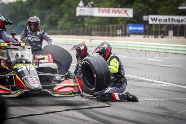 PIETRO FITTIPALDI (30) of Miami, Florida comes down pit road for service during the XPEL Grand Prix