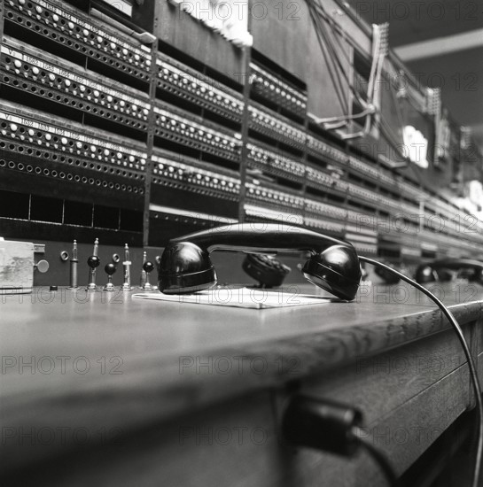 Telephony in the 1970s. Interior from an empty room with a large switchboard visible. Technology of
