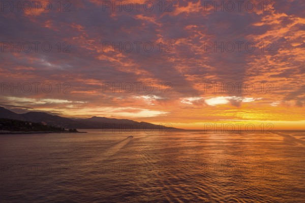 Aerial view of sunrise at Cap Martin, behind the Italian Ligurian coast, Roquebrune Cap Martin,