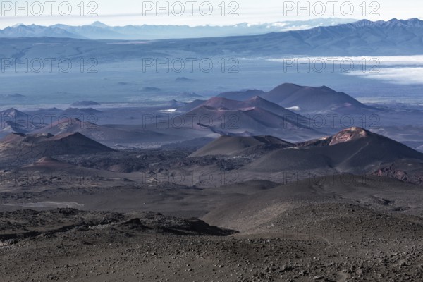 Beautiful volcano landscape of Kamchatka Peninsula: series of cinder cones and lava fields of