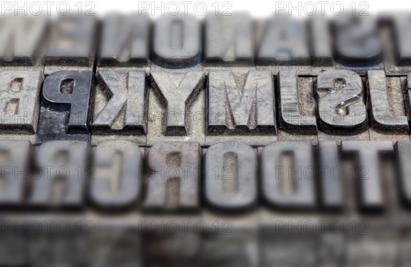 Hot metal printing setting, old letters made of lead for letterpress printing, Lettern aus dem