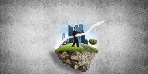 Conceptual image of young and confident business man in suit holding big white arrow in hands while