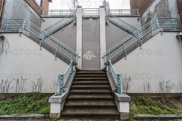 Belgium, 03 15 2019: The symmetric diagonal staircase of the dead end Auguste Snieder street with a