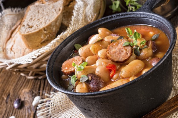 Polish baked beans with sausage