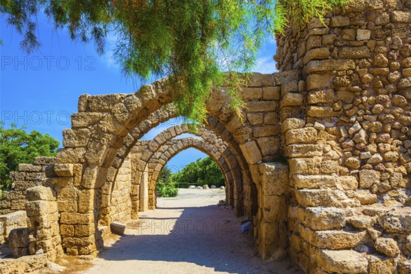 Superbly preserved ancient arched ceiling of stalls. National park Caesarea on the Mediterranean.