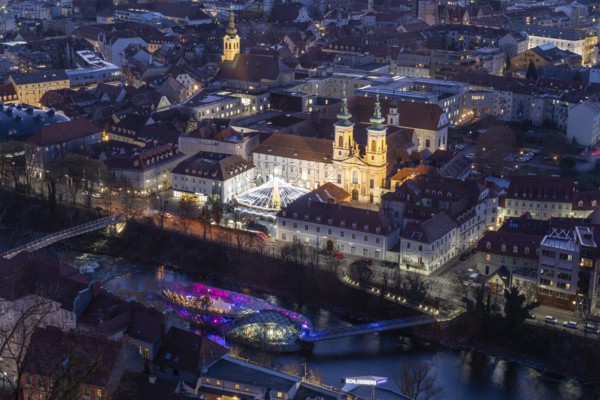 Evening atmosphere, view from the Schlossberg to the illuminated Murinsel and the