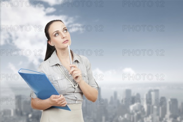 An image of a beautiful business woman in front of the big city