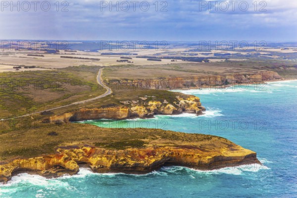 Scenic coastline. Picture taken from a helicopter. Great Ocean Road and the Twelve Apostles is a